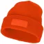 Boreas beanie with patch, Unisex, Single layer beanie with double folded edge 1x1 Rib knit of 100% Acrylic Patch of 100% Polyester, Orange